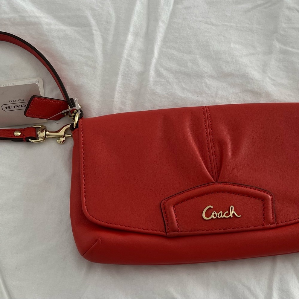 Coach wristlet purse salmon color brand new